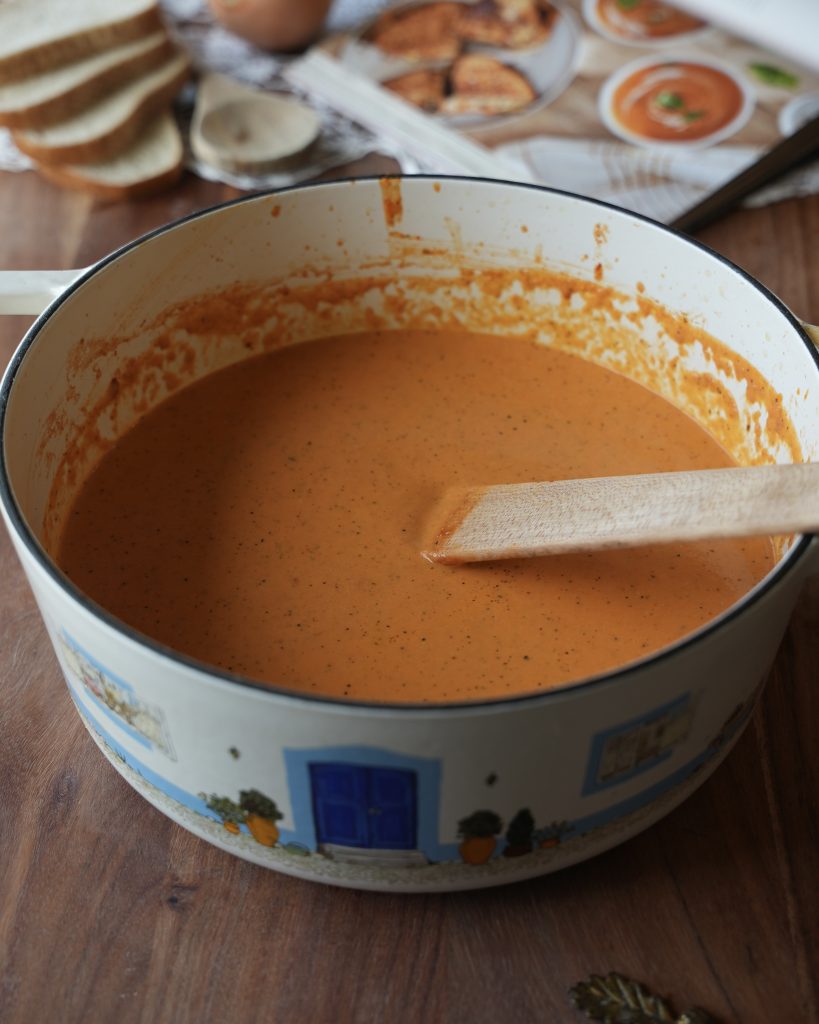 A pot of blended creamy tomato soup