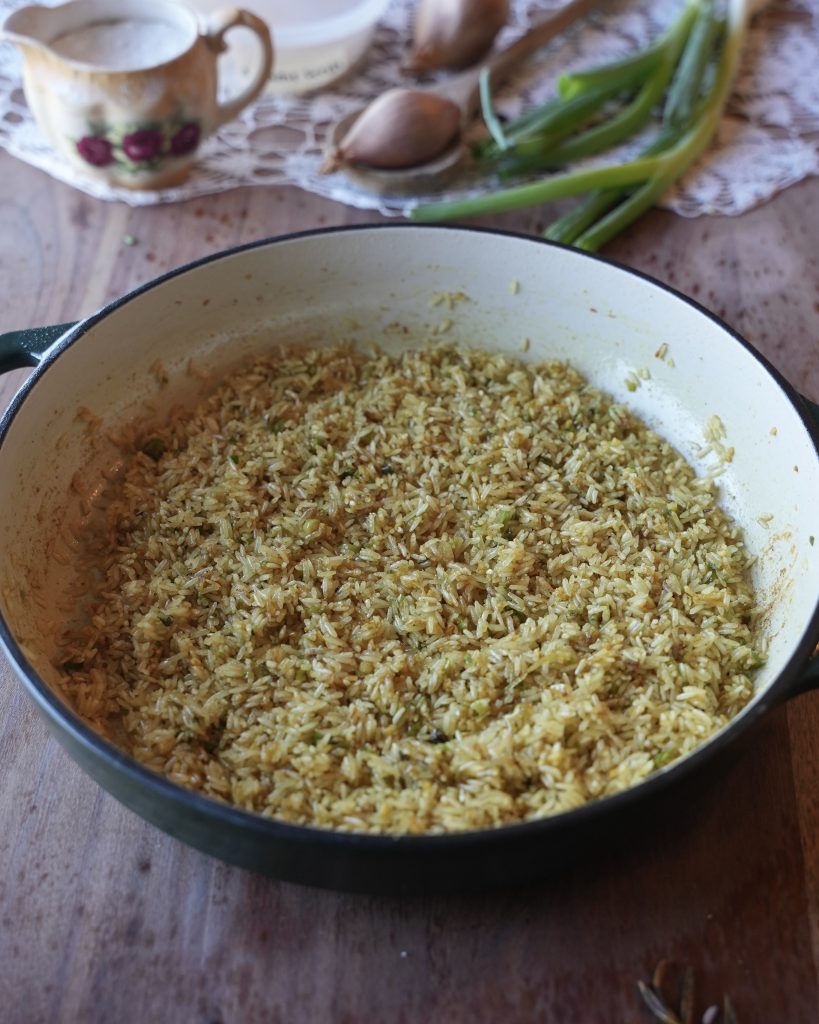 Jasmine rice toasted with ginger, garlic and scallions in butter